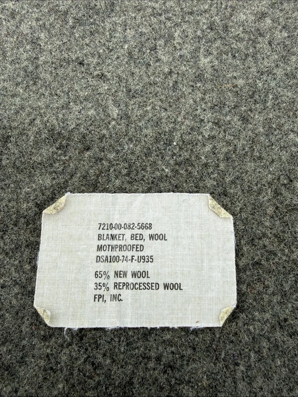 U.S. military wool bed blanket tag from the Vietnam War era. Vintage.